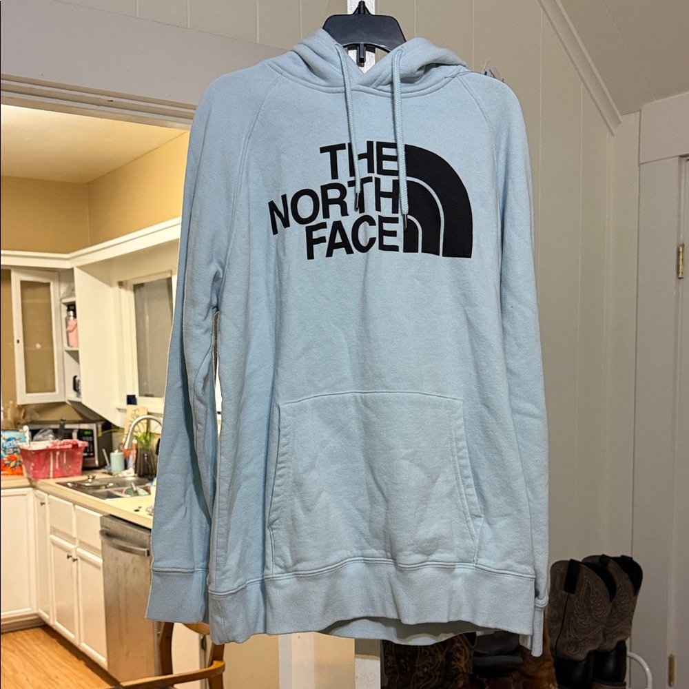 The North Face Women’s Light Blue Pullover Hoodie with Black Logo